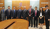 Delegates from China University of Political Science and Law pose for a group photo with members of CUHK